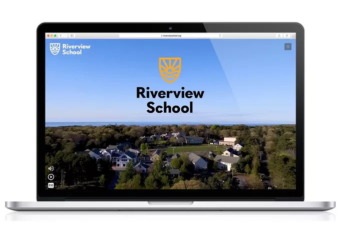 A computer displaying the new Riverview School website.